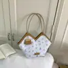 Bolso de hombro tote de gran capacidad con estampado fresco para mujer 2026 simple nuevo moderno moda primavera para ir al trabajo