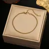 Pulseira Simples de Aço Titânio Europeia e Americana para Mulheres Estilo Ins Nicho Versátil de Alta Qualidade Conjunto de Pulseiras de Corrente Lisa Banhada a Ouro 18K