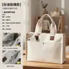 Bolsas de lona para eventos escolares, bolsas de mano para instituciones de capacitación grupal, impresión de logotipo personalizado, bolsas promocionales para la temporada de regreso a clases, directo del fabricante