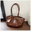 Bolsa de Hombro Retro Plegada de Gran Capacidad Moda Transfronteriza 2026 Nueva Bolsa Casual de Hombro/Axila para el Trabajo y el Viaje Diario para Mujeres