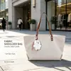 Bolso grande de mujer transfronterizo, nuevo bolso de hombro de moda otoño 2026, bolso tote texturizado casual para commuting de nicho