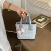Bolso casual de moda 2026 verano nuevo vintage simple nuevo bolso cubo texturizado para mujer hombro bandolera