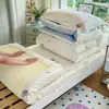 Juego de ropa de cama de tres piezas para dormitorio universitario de algodón, algodón puro, nuevo modelo 2026, sábana individual y funda de edredón, apto para todas las estaciones