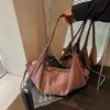 Design de nicho coreano transfronteiriço, bolsa de camurça fosca, nova coleção outono 2026, bolsa de ombro retrô para o dia a dia