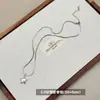 Collar de Acero de Titanio con Estrella de Cinco Puntas de Doble Capa Coreano para Mujer, Cadena Larga Versátil para Suéter, Accesorios de Alta Gama para Otoño e Invierno