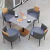 Conjunto minimalista de silla Teku de aleación de aluminio tejida con cuerda Olyfin y mesa redonda de losa de roca, Muebles de teca para patio exterior nórdico