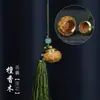 Colgante de calabaza de loto valiente tallado hueco de sándalo verde colgante de sándalo bolsita talla de madera colgante llavero para teléfono móvil