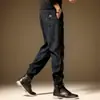Pantalones Casuales para Hombre Primavera y Otoño Pantalones Harem Rayados Modernos Versátiles Delgados Marca Moderna para Hombre Pantalones Largos Deportivos Sueltos con Puño