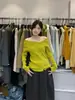 El único VI+ otoño estilo coreano suave y elegante versátil adelgazante de hombros descubiertos manga larga tejido para mujer 99800