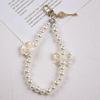 Retro marca de moda Pérola chaveiro estilo antigo simples pequenos ornamentos liga chaveiro cadeia de telefone móvel DIY saco pingente