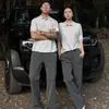 Camisa Polo para Hombre de Manga Corta con Cuello Henley Gris Americano Cleanfit Lujo Ligero Camiseta de Hombro Real Ajustada Estilo Nuevo 2026