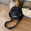Bolso Cruzado Compacto de Color Puro Japonés y Coreano para Mujer 2025 Nuevo Diseño Casual de Nicho Bolso para Teléfono Móvil Bolso de Tela Ligera Transfronterizo