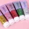 Gel de gel con lentejuelas mixtas láser transfronterizo sin pegamento alto brillo maquillaje material para maquillaje de fiesta navideña al por mayor