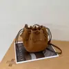 2026 Nuevo Bolso Cubo Retro Milenial con Borlas para Mujer Bolsa Pequeña Esmerilada con Cordón Bolso Cruzado de Hombro Único de Nicho