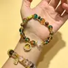 Nuevo brazalete de cristal degradado color sandía original combinado con brazalete del área escénica del templo thangka, artículo popular para venta al por mayor