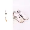 Nuevos dijes de zapatos anudados de colores de la serie Miu, hebillas de zapato tejidas hechas a mano para bricolaje, entrenamiento moral, accesorios de zapato de canguro, venta al por mayor