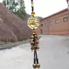 Esmalte amarelo enfeites de cristal para carro enfeites decorativos para carro acessórios para carro Buda segurando pingente acessórios para carro vendas diretas da fábrica