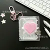 Álbum de fotos de corazón hueco con purpurina PVC mini álbum de fotos colgante de llavero abanico libro de almacenamiento de tarjetas