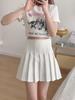En Stock Falda plisada gris cielo estrellado Primavera/Verano 2026 Cintura alta Adelgazante Estilo universitario Jk Falda corta Versátil Venta al por mayor