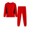 Ropa interior térmica deportiva de lyocell y acetato para niños de otoño e invierno 2026 nuevo modelo conjunto de hogar de tops y pantalones de otoño para niños y niñas