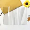 Ventas Directas de Fábrica Cubierta de Libro Transparente de PVC Goma Suave Cubierta de Libro de Voltaje Nietzsche con Cubierta para Cuaderno B6 con Logo Estampado en Cuero