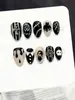 Uñas vestibles de Halloween superventas transfronterizas europeas y americanas, piezas de arte de uñas de calabaza, calavera y fantasma puramente hechas a mano, productos terminados para venta al por mayor de alta gama