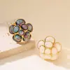 Anillo con apertura ajustable, temperamento francés suave, fresco y artístico, camelia tridimensional, joyería de mano de hada de lujo de alta gama