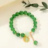 [Venta al por mayor directa de fábrica] Nuevo estilo chino Imitación Jade Dongling Puesto de Exhibición de Feria de Templo del Mercado Nocturno Pulsera de Vidrio Joyería Más Vendido