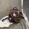 Mochila de camurça com estampa de leopardo retrô para outono e inverno para mulheres, novo estilo 2026, design de urso fofo, fechamento com cordão, mochila pequena, mochila escolar para estudante