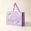 Sacos de papel de pequena tiragem Yiwu feitos sob medida sacolas de compras de papel para roupas femininas sacolas de presente de alta qualidade feitas sob medida para lojas de roupas corporativas sacolas de presente