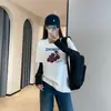 Zedaijiayi Camiseta de Manga Corta Redonda de Lana Australiana Engrosada con Bordado de Letras de Tomate Curativo Reductor de Edad para Mujer Modelo Nuevo 2026