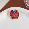 Medalla Musical de Mister Rogers de Venta Caliente Europea y Americana Exquisito Estilo Suéter Rojo Broche de Alta Gama