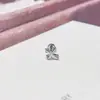 Arete único de botón para cartílago con flor de iris cruzada y tachonado de diamantes, pendientes de moda versátiles y femeninos, versátiles y elegantes para mujer