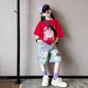 Conjunto de Manga Corta para Niña Verano 2026 Nuevo Estilo Niños Mayores Casual Pantalones de Cinco Puntos Conjunto de Verano Shorts de Mezclilla Pintados Conjunto de Dos Piezas