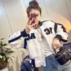 Chaqueta de béisbol retro americana con bloques de color para mujer, nuevo estilo otoño 2025, chaqueta corta de corte holgado