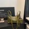 2026 Nuevo Estilo Coreano Simple Perezoso Color Sólido Textura Tejida Gran Capacidad Sensación Relajada Para Ir al Trabajo Personalidad Bolso de Hombro Único
