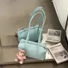 Bolso tipo almohada casual nuevo de verano 2026, Bolso de hombro único de alto estilo para el trabajo, Bolso de axila de nicho a la moda para mujer