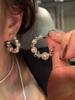 Aretes de mujer más vendidos 2025, nicho de alta gama, temperamento de lujo ligero, aretes de circonita, aretes de aguja de plata 925 al por mayor