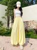 Calça Saia Botão de Flor Feminina Verão Novo Cintura Alta Emagrecedora Solta Cropped Casual Perna Larga Preguiçoso Bufante Bloomers
