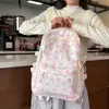 Mochila floral minimalista estilo bosque 2026 conjunto de tres piezas estilo campus transfronterizo mochila escolar para estudiantes de secundaria y preparatoria mochila de viaje