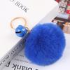 Bola de pelo de conejo anti-Rex, llavero con campana, colgante para teléfono móvil, mochila escolar, colgante para coche, 2 yuanes, suministro de tienda, pequeños regalos