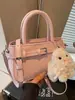 Bolsa de Mão Transfronteiriça Feminina 2026 Novo Estilo Coreano Nicho Bolsa de Ombro Super Popular Simples Casual Transversal Pequena Quadrada