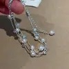 Pulsera de Manta Multicapa con Perlas Rosas para Mujer, Estilo Francés de Lujo Ligero, Nicho Exquisito con Acabado de Alta Gama