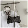 Bolso de mano para mujer de estilo europeo y americano con estampado de leopardo para comercio exterior, nuevo diseño de nicho de moda 2026, bolso simple de hombro y axila