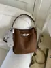 Bolso de Mujer Retro de Nicho de Moda Tendencia 2025 Nuevo Bolso Cruzado Versátil Casual Bolso de Mano de Gama Alta Bolso Cubo
