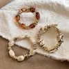 Pulsera elástica de acrílico geométrico irregular vintage nueva con un diseño de nicho, joyería de moda trendy para mujer