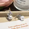 Pendientes de Plata de Ley S925 con Doble C Dorado y Perla Blanca para Mujer, Lujo Ligero, Gama Alta, Pendientes Elegantes, Nuevo Estilo 2026, Elegantes