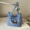 Bolsa de ombro de brim estilosa com design de cachorrinho bordado, versátil, grande capacidade, bolsa tote casual e texturizada