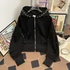 Ventas Directas de Fábrica Otoño Nuevo Diseño de Nicho Americano Chaqueta Corta con Capucha de Perlas para Hombre Chaqueta Negra Retro