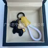 Dinero en el Caballo Cuero de Vaca Creativo Exquisito Casual Regalo de Pareja Bolso Lindo Colgante Llavero de Coche Llavero